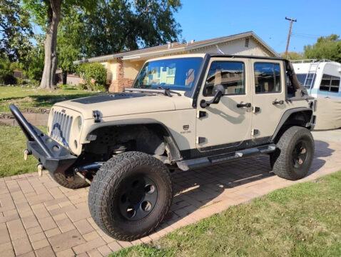 2011 Jeep Wrangler Unlimited Sahara Sport Utility 4D na prodej